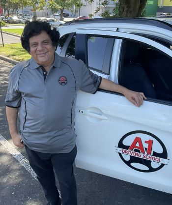 Azim_with_car_350_x_417.jpg